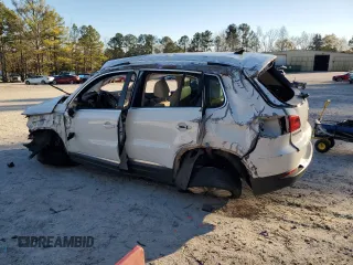 2014 Volkswagen Tiguan SE z VIN WVGAV3AX1EW523157, wystawiony jako Copart lot #82111894 z przebiegiem 103 172 mil mil oraz Szkoda całkowita • Salvage title. Historia ofert i sprzedaży dostępna na DreamBid. Obrazek 2.