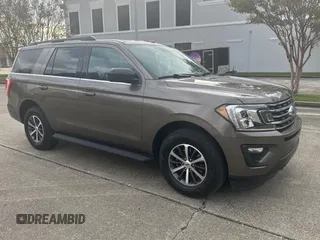 2019 Ford Expedition XL z VIN 1FMJU1GT1KEA12447, wystawiony jako Copart lot #81815824 z przebiegiem 93 177 mil mil oraz Czysty tytuł • Clean title. Historia ofert i sprzedaży dostępna na DreamBid. Obrazek 1.