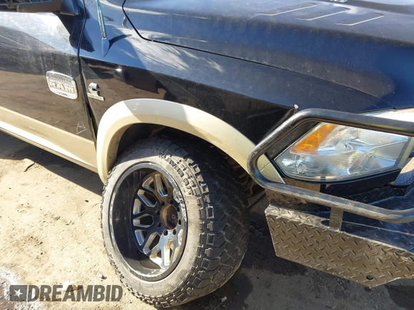 2012 Ram 2500 Laramie Longhorn with VIN 3C6UD5GLXCG236343, listed as a IAAI auction lot 40491864 with 131,677 mi miles. Bid and sale history available at carsss.com. Image 6.