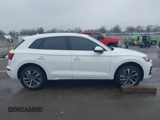 2021 Audi Q5 Premium Plus z VIN WA1BAAFY8M2077292, wystawiony jako IAAI lot #41663216 z przebiegiem 35 378 mil mil oraz . Historia ofert i sprzedaży dostępna na DreamBid. Obrazek 14.