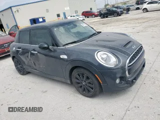 2016 MINI Hardtop 4 Door S with VIN WMWXU3C52G2D30894, listed as a Copart auction lot 50871865 with Not provided miles and Salvage title. Bid and sale history available at DreamBid. Image 4.