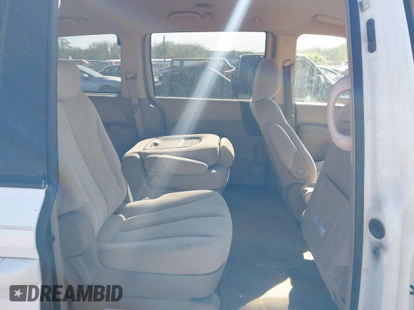 2006 Kia Sedona LX with VIN KNDMB233866052026, listed as a IAAI auction lot 42095980 with 230,320 mi miles. Bid and sale history available at carsss.com. Image 8.