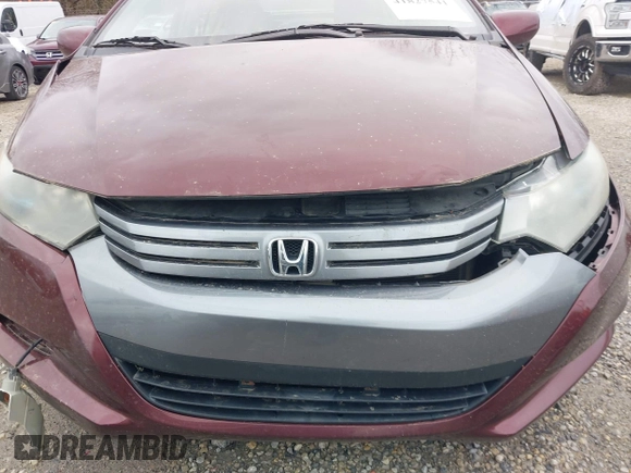 2011 Honda Insight LX z VIN JHMZE2H52BS004304, wystawiony jako IAAI lot #41827541 z przebiegiem 141 072 mil mil oraz . Historia ofert i sprzedaży dostępna na DreamBid. Obrazek 6.