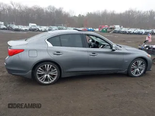 2016 Infiniti Q50 3.0t Red Sport 400 with VIN JN1FV7AR3GM451964, listed as a IAAI auction lot 41715544 with 164,139 mi miles. Bid and sale history available at carsss.com. Image 12.