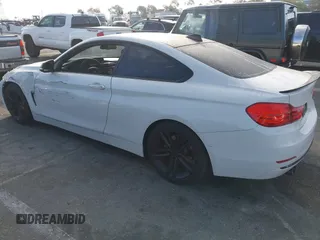 2014 BMW 4 Series 428i with VIN WBA3N3C5XEF710869, listed as a IAAI auction lot 40984116 with 115,958 mi miles and . Bid and sale history available at DreamBid. Image 3.