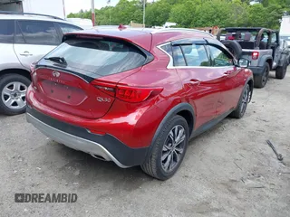 2017 Infiniti QX30 Premium with VIN SJKCH5CRXHA032082, listed as a IAAI auction lot 42376012 with 73,814 mi miles and . Bid and sale history available at DreamBid. Image 4.