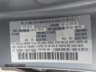 2014 Mazda 3 i Touring with VIN 3MZBM1L74EM116489, listed as a IAAI auction lot 41932973 with 89,817 mi miles and . Bid and sale history available at DreamBid. Image 9.