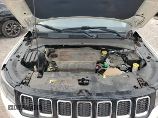 2018 Jeep Compass Sport z VIN 3C4NJCAB3JT123431, wystawiony jako Copart lot #63045144 z przebiegiem 118 849 mil mil oraz Szkoda całkowita • Salvage title. Historia ofert i sprzedaży dostępna na DreamBid. Obrazek 12.
