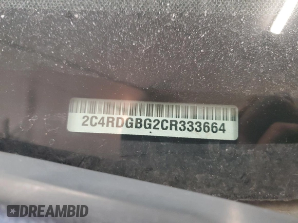 2012 Dodge Grand Caravan SE with VIN 2C4RDGBG2CR333664, listed as a Copart auction lot 46734485 with 211,138 mi miles and Salvage Title. Bid and sale history available at DreamBid. Image 13.