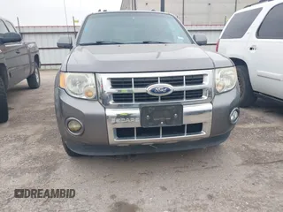 2012 Ford Escape Limited with VIN 1FMCU0E73CKB02517, listed as a IAAI auction lot 41594495 with 195,945 mi miles. Bid and sale history available at carsss.com. Image 6.