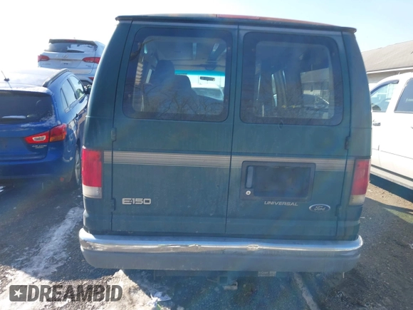 1999 Ford Econoline Cargo with VIN 1FDRE14W3XHB36482, listed as a IAAI auction lot 41393346 with 130,669 mi miles. Bid and sale history available at carsss.com. Image 16.
