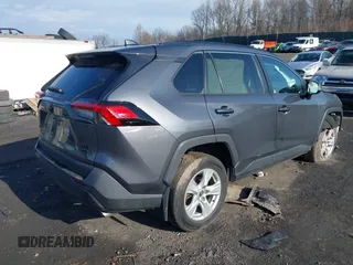 2020 Toyota RAV4 XLE with VIN 2T3P1RFV2LW130185, listed as a IAAI auction lot 42033372 with 98,667 mi miles and . Bid and sale history available at DreamBid. Image 4.