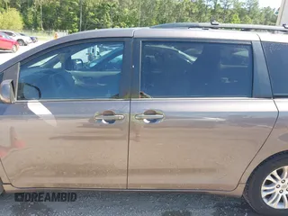 2012 Toyota Sienna XLE AAS with VIN 5TDYK3DC5CS259216, listed as a IAAI auction lot 42143551 with 219,957 mi miles and . Bid and sale history available at DreamBid. Image 14.