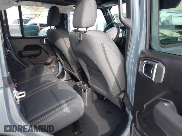 2024 Jeep Wrangler Sport S with VIN 1C4PJXDN2RW306332, listed as a IAAI auction lot 41036573 with 1,785 mi miles and . Bid and sale history available at DreamBid. Image 8.