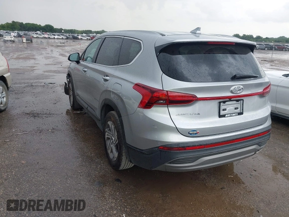 2023 Hyundai Santa Fe SE with VIN 5NMS14AJ5PH626769, listed as a IAAI auction lot 42637931 with 10,712 mi miles and . Bid and sale history available at DreamBid. Image 3.