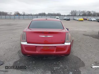 2012 Chrysler 300 Limited z VIN 2C3CCACG7CH250858, wystawiony jako IAAI lot #41709739 z przebiegiem 236 991 mil mil oraz . Historia ofert i sprzedaży dostępna na DreamBid. Obrazek 16.