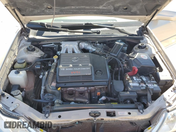 2002 Toyota Avalon XL z VIN 4T1BF28B72U200700, wystawiony jako Copart lot #50809455 z przebiegiem 151 328 mil mil oraz Szkoda całkowita • Salvage title. Historia ofert i sprzedaży dostępna na DreamBid. Obrazek 13.