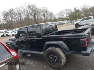 2022 Jeep Gladiator High Altitude z VIN 1C6HJTFG1NL164764, wystawiony jako IAAI lot #41727357 z przebiegiem 28 222 mil mil oraz . Historia ofert i sprzedaży dostępna na DreamBid. Obrazek 14.