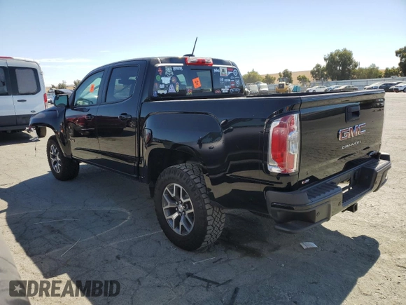 2021 GMC Canyon 4WD AT4 w/Cloth with VIN 1GTG6FEN4M1268263, listed as a Copart auction lot 72393764 with 42,249 mi miles and Salvage Title. Bid and sale history available at carsss.com. Image 2.
