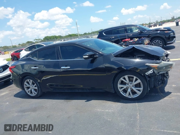 2016 Nissan Maxima S z VIN 1N4AA6AP3GC434993, wystawiony jako IAAI lot #42457183 z przebiegiem 100 569 mil mil oraz . Historia ofert i sprzedaży dostępna na DreamBid. Obrazek 13.