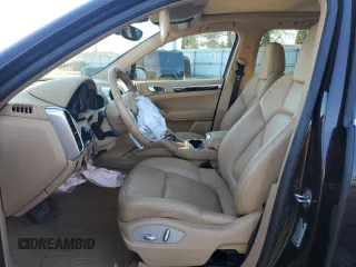 2014 Porsche Cayenne z VIN WP1AA2A22ELA96960, wystawiony jako Copart lot #48517675 z przebiegiem Nie podano mil oraz Szkody całkowita. Historia ofert i sprzedaży dostępna na DreamBid. Obrazek 7.