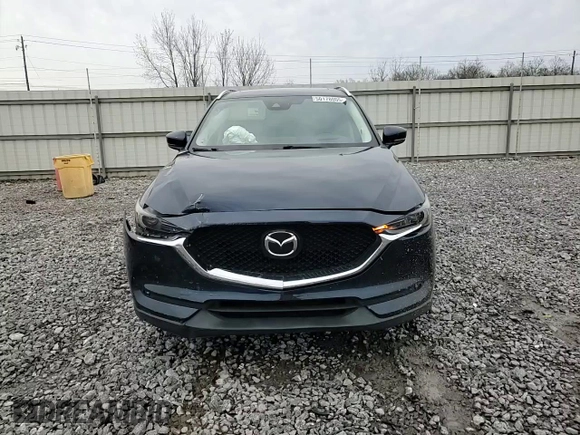 2017 Mazda CX-5 Grand Touring with VIN JM3KFADL3H0125143, listed as a Copart auction lot 50178005 with 160,058 mi miles and Salvage Title. Bid and sale history available at carsss.com. Image 11.