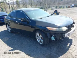2009 Acura TSX with VIN JH4CU26699C030973, listed as a IAAI auction lot 42039769 with 298,307 mi miles. Bid and sale history available at carsss.com. Image 1.