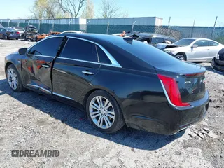 2018 Cadillac XTS Luxury with VIN 2G61M5S39J9161938, listed as a IAAI auction lot 42005882 with 102,335 mi miles. Bid and sale history available at carsss.com. Image 3.