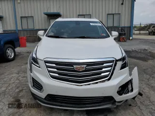 2020 Cadillac XT5 Premium Luxury FWD with VIN 1GYKNCRS5LZ229686, listed as a Copart auction lot 57391915 with 54,491 mi miles and Salvage title. Bid and sale history available at DreamBid. Image 5.