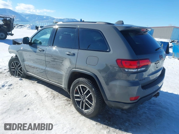 2021 Jeep Grand Cherokee Trailhawk with VIN 1C4RJFLG2MC854007, listed as a IAAI auction lot 41512394 with 50,674 mi miles. Bid and sale history available at carsss.com. Image 3.