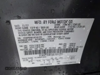 2018 Ford Taurus SEL z VIN 1FAHP2E85JG101221, wystawiony jako IAAI lot #42242127 z przebiegiem 123 787 mil mil oraz . Historia ofert i sprzedaży dostępna na DreamBid. Obrazek 9.