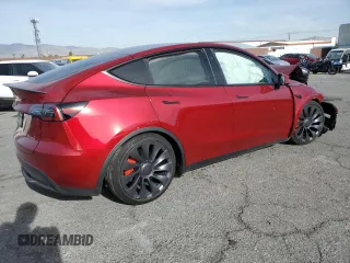 2024 Tesla Model Y Performance z VIN 7SAYGDEF7RF128112, wystawiony jako Copart lot #85596764 z przebiegiem Nie podano mil oraz Szkoda całkowita • Salvage title. Historia ofert i sprzedaży dostępna na DreamBid. Obrazek 3.