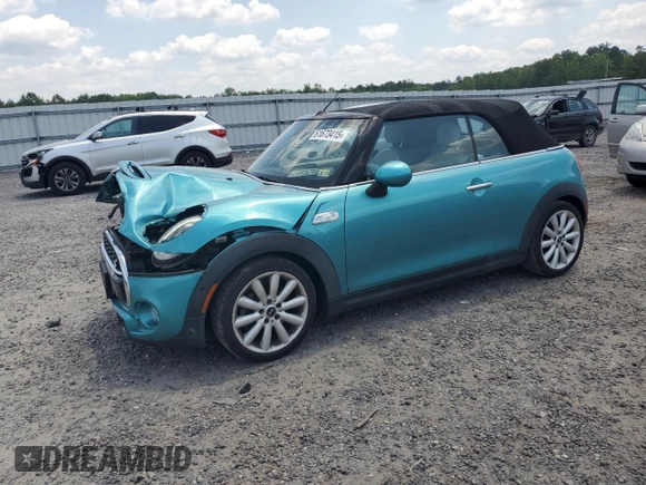 2018 MINI Convertible Cooper S with VIN WMWWG9C59J3D22587, listed as a Copart auction lot 61673415 with 34,935 mi miles and Salvage title. Bid and sale history available at DreamBid. Image 1.