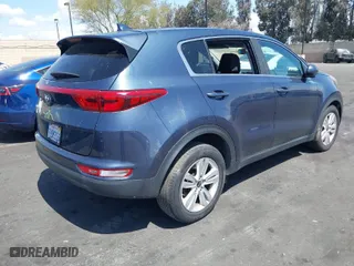 2017 Kia Sportage LX with VIN KNDPM3AC7H7192677, listed as a IAAI auction lot 41949008 with 142,647 mi miles. Bid and sale history available at carsss.com. Image 4.