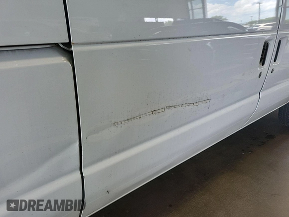 2013 Ford Econoline Cargo Commercial with VIN 1FTNE1EW3DDA61111, listed as a IAAI auction lot 42786321 with 199,373 mi miles and . Bid and sale history available at DreamBid. Image 4.