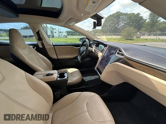 2014 Tesla Model S 60 z VIN 5YJSA1H11EFP44322, wystawiony jako Copart lot #59038135 z przebiegiem 146 015 mil mil oraz Czysty tytuł • Clean title. Historia ofert i sprzedaży dostępna na DreamBid. Obrazek 5.
