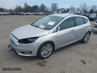 2015 Ford Focus Titanium with VIN 1FADP3N27FL228549, listed as a IAAI auction lot 41912941 with 69,025 mi miles. Bid and sale history available at carsss.com. Image 17.