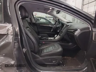 2015 Ford Fusion SE z VIN 3FA6P0HD0FR132316, wystawiony jako IAAI lot #41770636 z przebiegiem 185 681 mil mil oraz . Historia ofert i sprzedaży dostępna na DreamBid. Obrazek 5.
