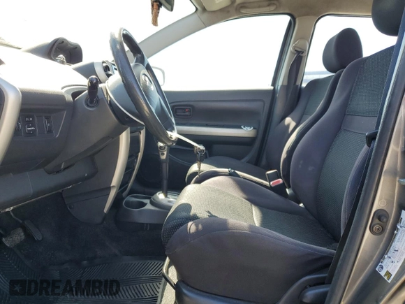 2004 Scion xA with VIN JTKKT624140043635, listed as a Copart auction lot 52808815 with 197,115 mi miles and Salvage Title. Bid and sale history available at DreamBid. Image 7.