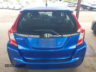 2015 Honda Fit LX z VIN 3HGGK5H51FM711607, wystawiony jako IAAI lot #42249495 z przebiegiem Nie podano mil oraz . Historia ofert i sprzedaży dostępna na DreamBid. Obrazek 17.