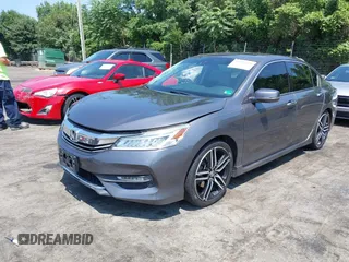 2016 Honda Accord Touring with VIN 1HGCR3F94GA009459, listed as a IAAI auction lot 42597128 with 182,977 mi miles and . Bid and sale history available at DreamBid. Image 2.