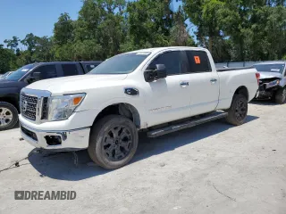 2016 Nissan Titan SL z VIN 1N6BA1F46GN514970, wystawiony jako Copart lot #58374465 z przebiegiem 75 272 mil mil oraz Czysty tytuł • Clean title. Historia ofert i sprzedaży dostępna na DreamBid. Obrazek 1.