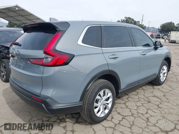 2024 Honda CR-V LX with VIN 2HKRS4H24RH458042, listed as a IAAI auction lot 41682149 with 3,430 mi miles and . Bid and sale history available at DreamBid. Image 4.