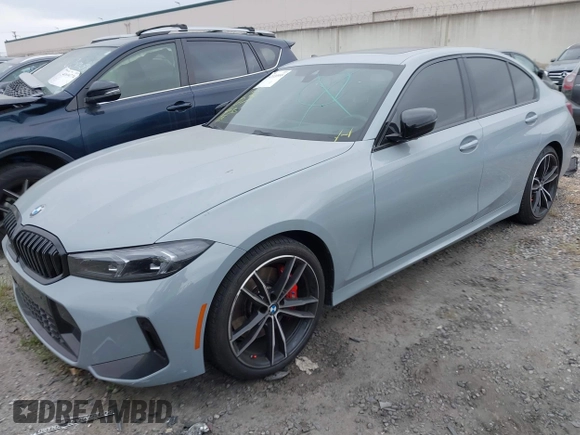 2024 BMW 3 Series 330i with VIN 3MW69FF04R8E41348, listed as a IAAI auction lot 42020955 with 23,395 mi miles. Bid and sale history available at carsss.com. Image 2.