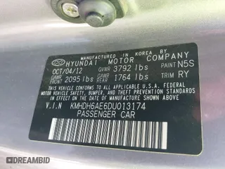 2013 Hyundai Elantra Coupe GS with VIN KMHDH6AE6DU013174, listed as a IAAI auction lot 41771119 with 143,115 mi miles. Bid and sale history available at carsss.com. Image 9.