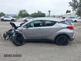 2018 Toyota C-HR XLE with VIN NMTKHMBX4JR023586, listed as a IAAI auction lot 41890863 with 86,958 mi miles and . Bid and sale history available at DreamBid. Image 14.