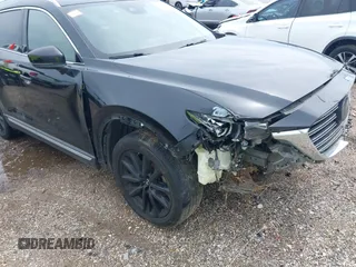 2018 Mazda CX-9 Grand Touring with VIN JM3TCADY3J0228643, listed as a IAAI auction lot 42481641 with 121,714 mi miles and . Bid and sale history available at DreamBid. Image 17.