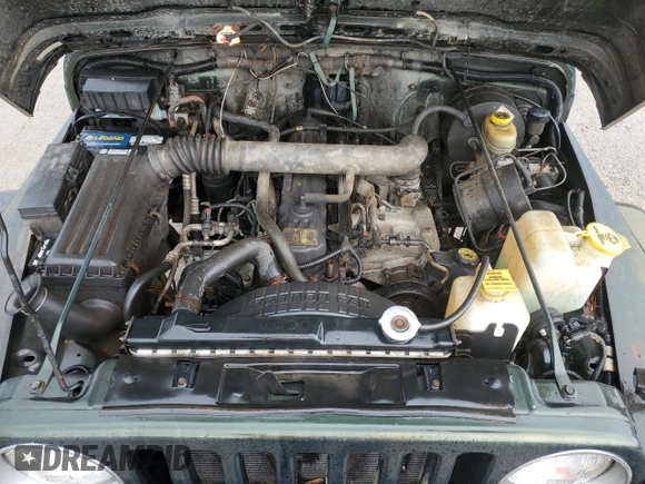 1997 Jeep Wrangler Sahara with VIN 1J4FY49SXVP453369, listed as a Copart auction lot 72826744 with 145,852 mi miles and Salvage Title. Bid and sale history available at carsss.com. Image 12.