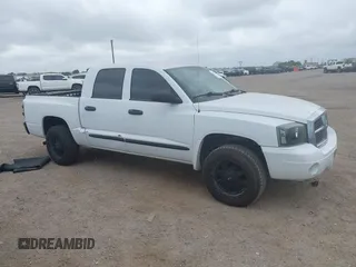 2006 Dodge Dakota SLT with VIN 1D7HE48K56S532946, listed as a IAAI auction lot 41878467 with 106,218 mi miles. Bid and sale history available at carsss.com. Image 1.