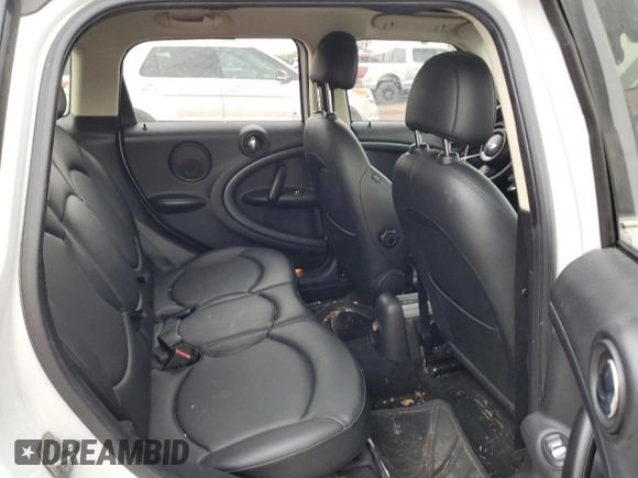 2013 MINI Countryman S ALL4 with VIN WMWZC5C51DWP34357, listed as a Copart auction lot 54945905 with 125,355 mi miles and Salvage title. Bid and sale history available at DreamBid. Image 10.